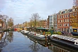 Swiss Alps, Amsterdam Canals & Parisian Wonders + Disneyland Paris Excursion